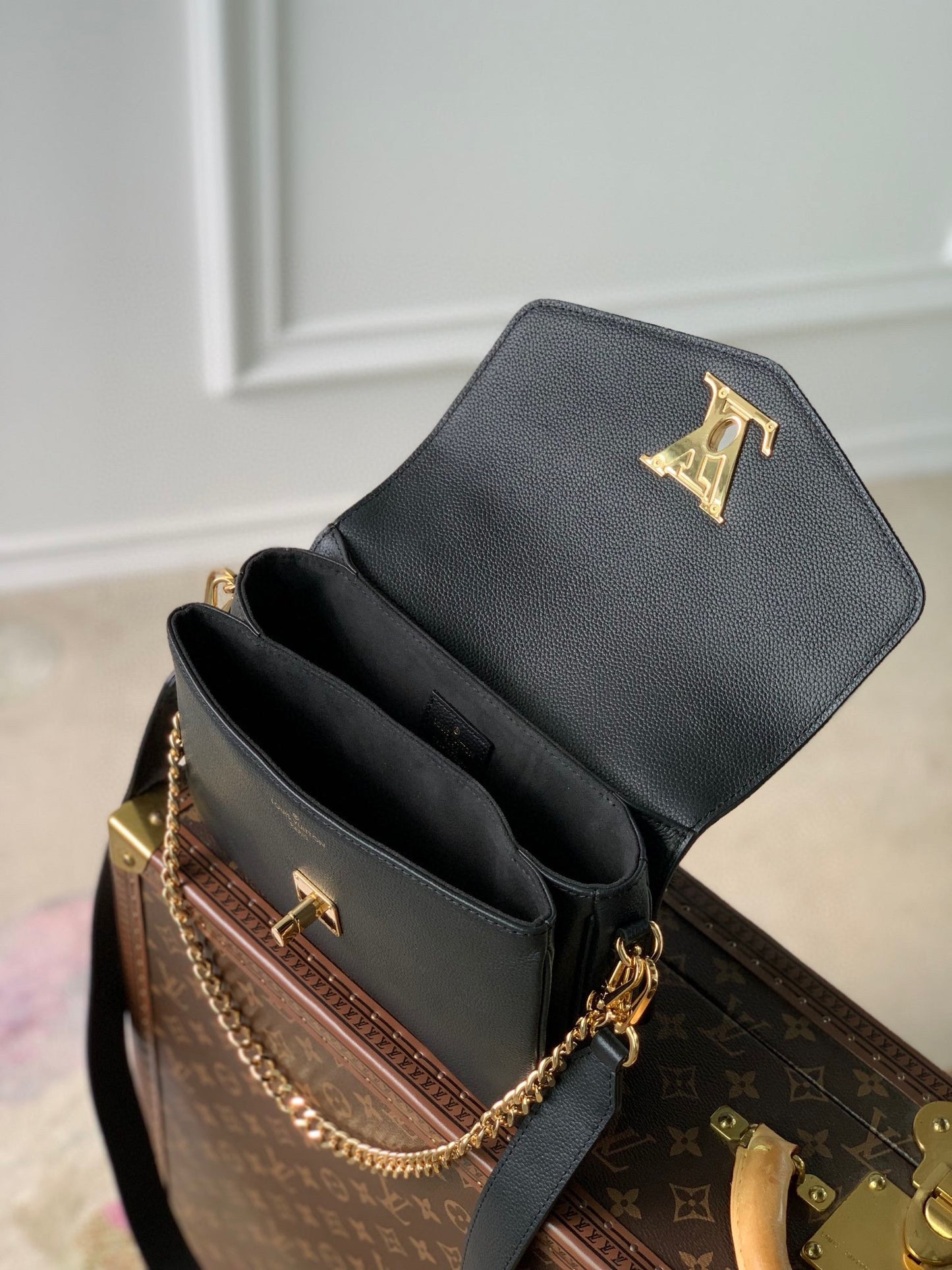 Elegant Black Crossbody Bag with Gold-Tone Hardware and Top Handle