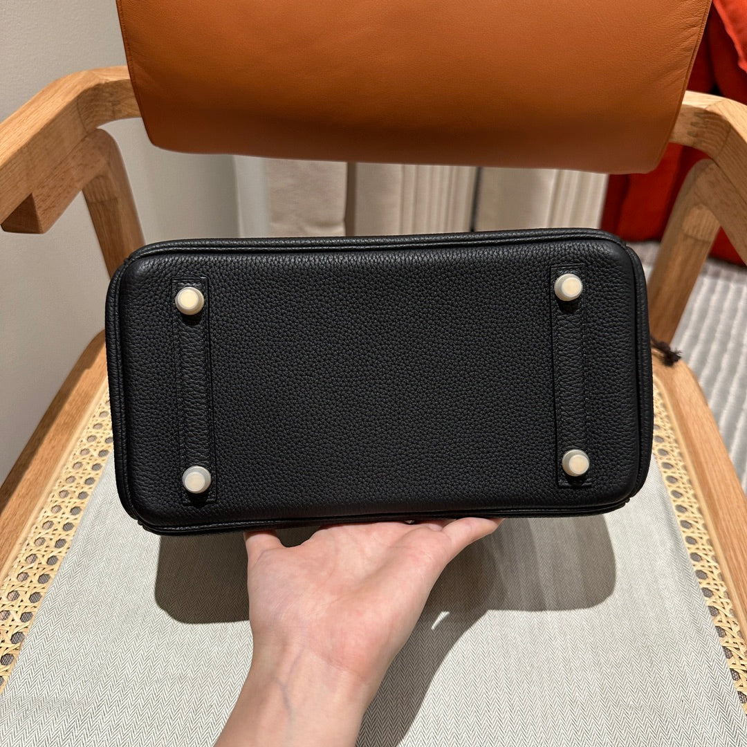 Luxury Black Leather Top-Handle Handbag with Horse Charm and Gold Hardware