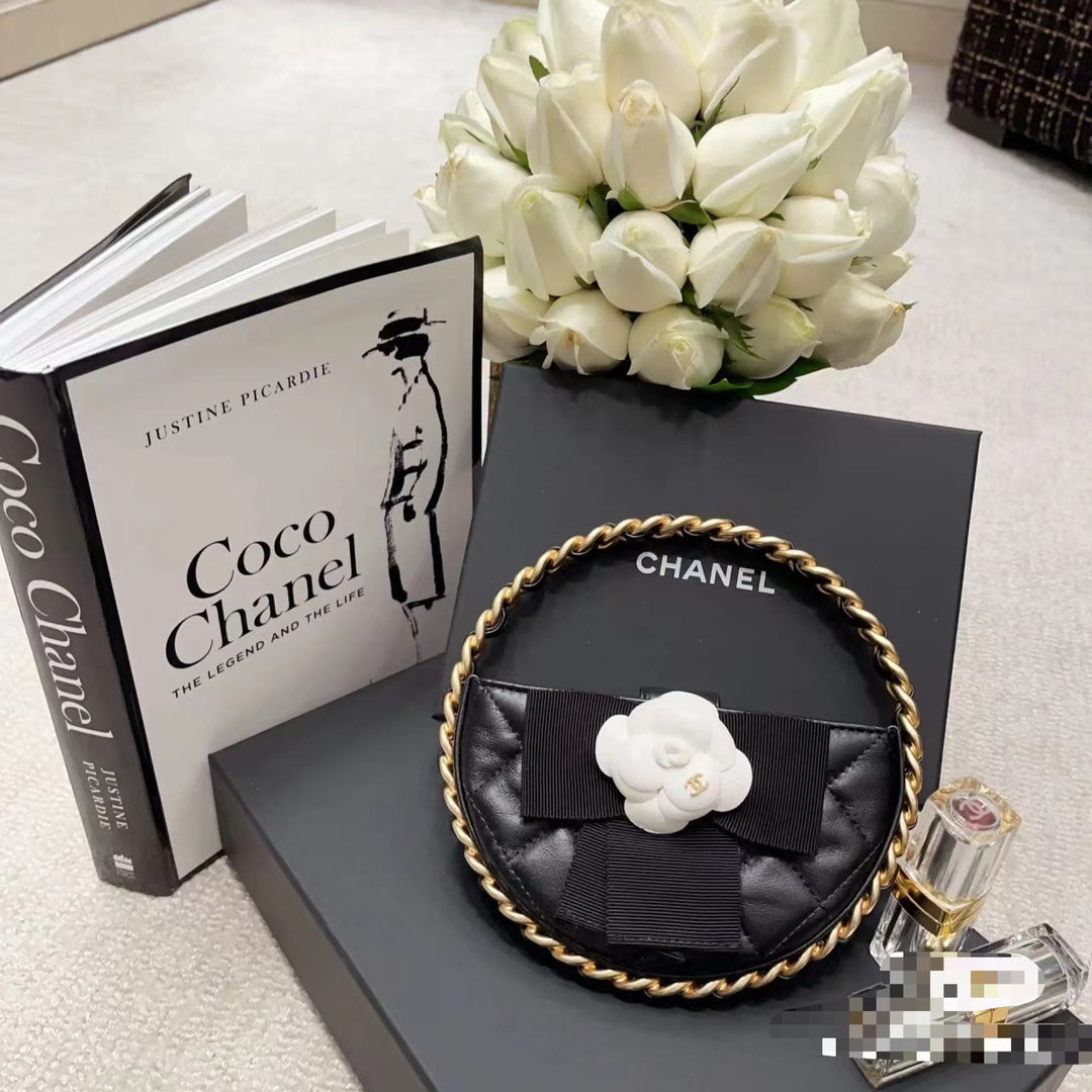Chanel Small Round Camellia Handbag - Quilted Black Lambskin