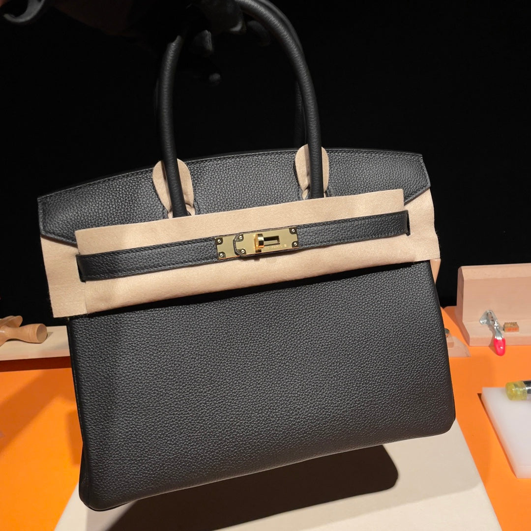 Luxury Handcrafted Black Grained Leather Top Handle Bag with Gold Hardware