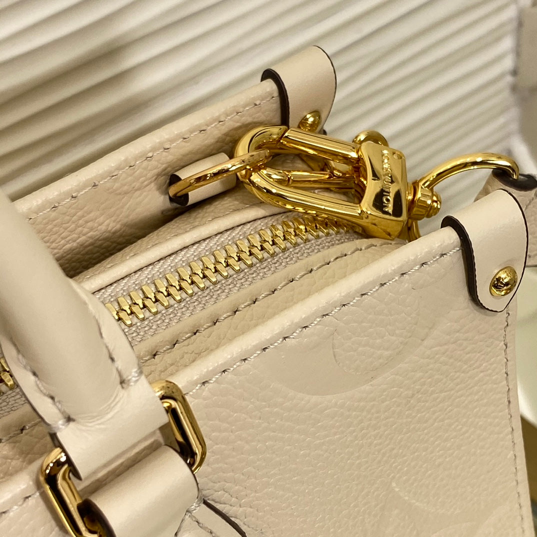 Louis Vuitton Palais East West Monogram Empreinte Leather Handbag - Cream