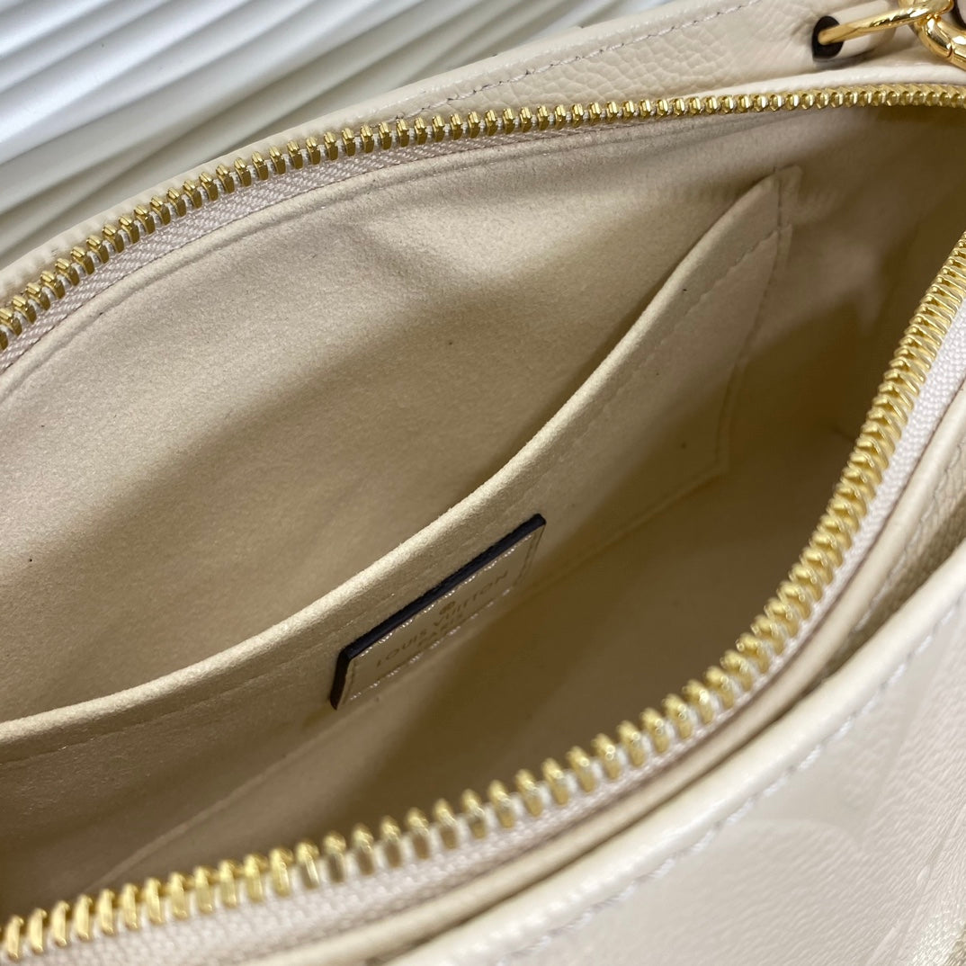 Louis Vuitton Palais East West Monogram Empreinte Leather Handbag - Cream