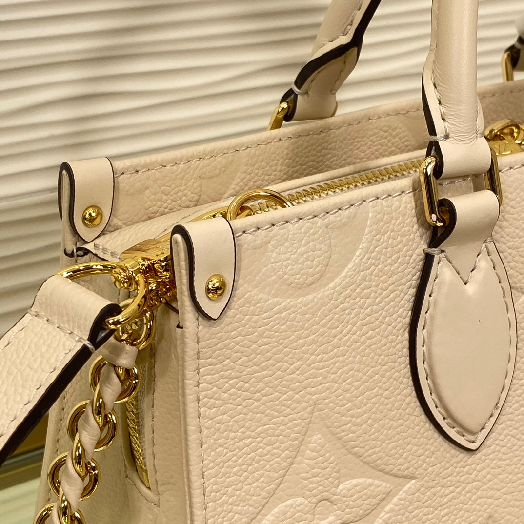 Louis Vuitton Palais East West Monogram Empreinte Leather Handbag - Cream