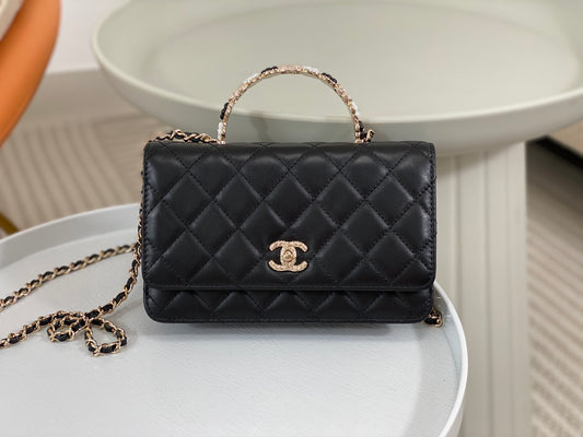 Chanel Black Quilted Leather Flap Bag with Top Handle and Gold Hardware