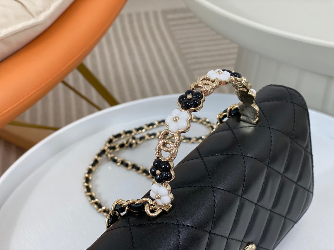 Chanel Black Quilted Leather Flap Bag with Top Handle and Gold Hardware