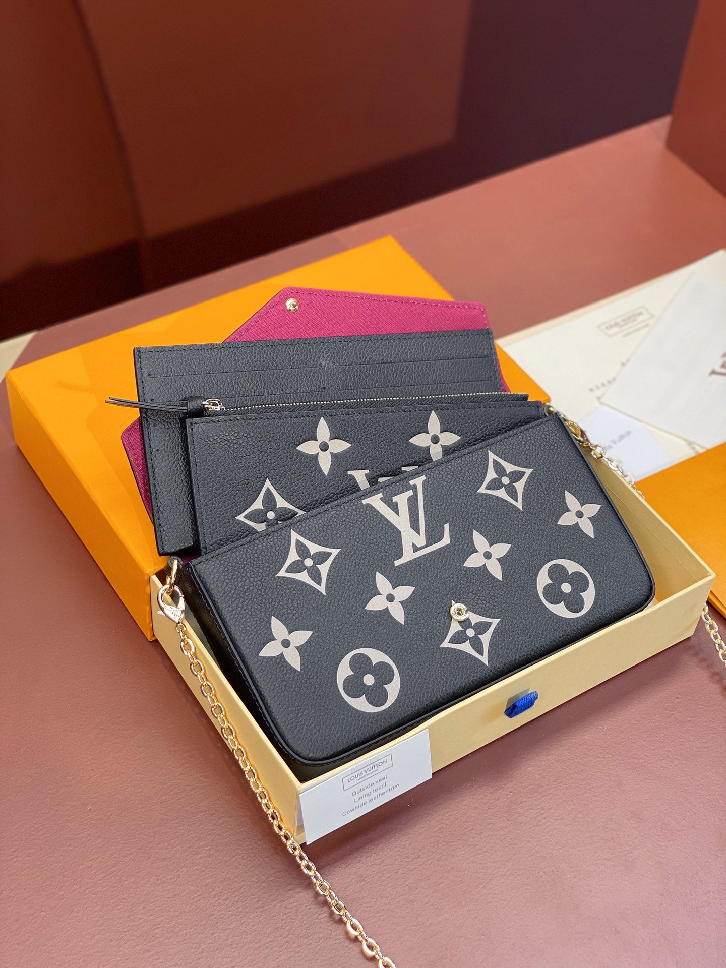 Louis Vuitton Félicie Pochette Bicolor Monogram Empreinte Leather Bag