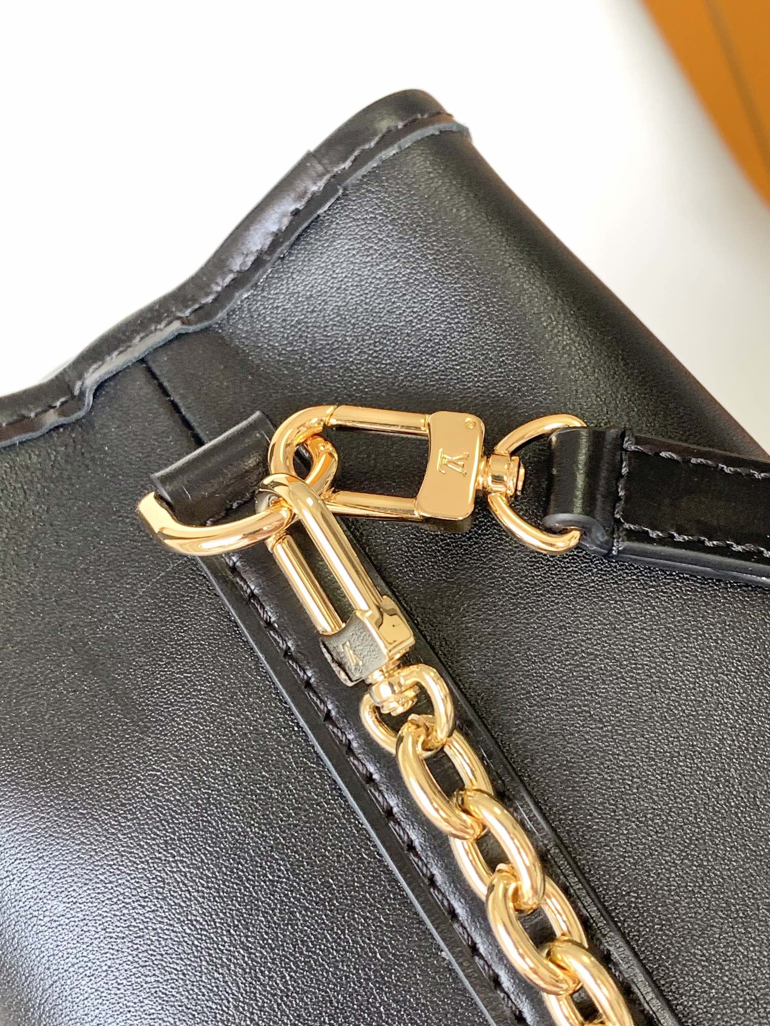 Louis Vuitton Black Leather Bucket Handbag with Gold-Tone Hardware & Chain