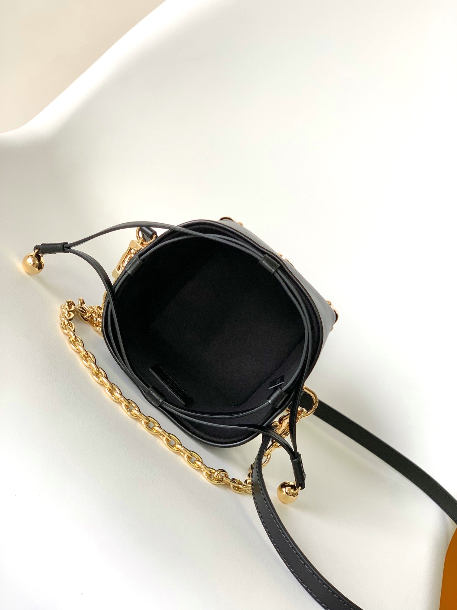 Louis Vuitton Black Leather Bucket Handbag with Gold-Tone Hardware & Chain