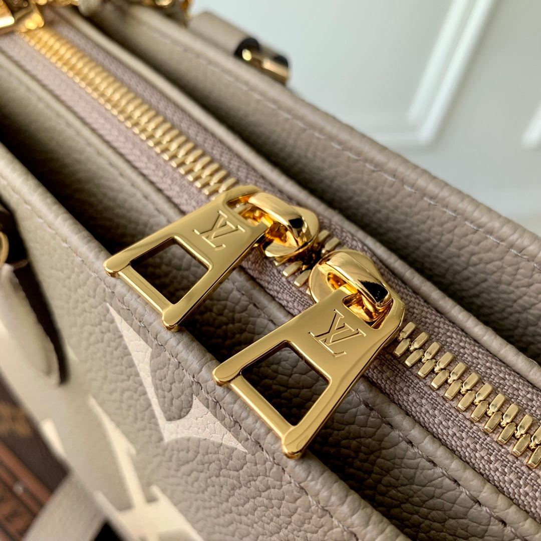 Louis Vuitton OnTheGo East West Bicolor Monogram Empreinte Leather Handbag - Tourterelle / Crème