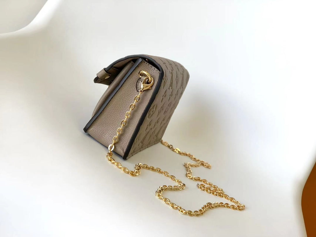 Louis Vuitton Vavin Chain Wallet Monogram Empreinte Leather Turtledove