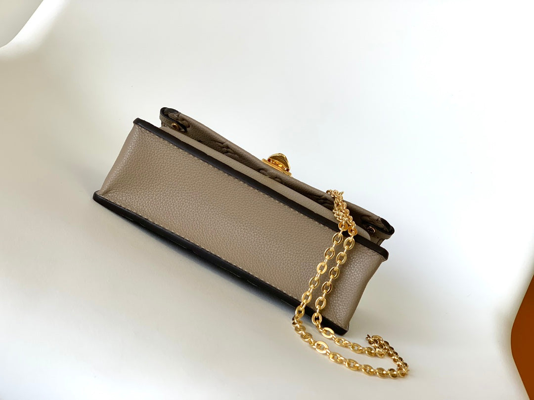 Louis Vuitton Vavin Chain Wallet Monogram Empreinte Leather Turtledove