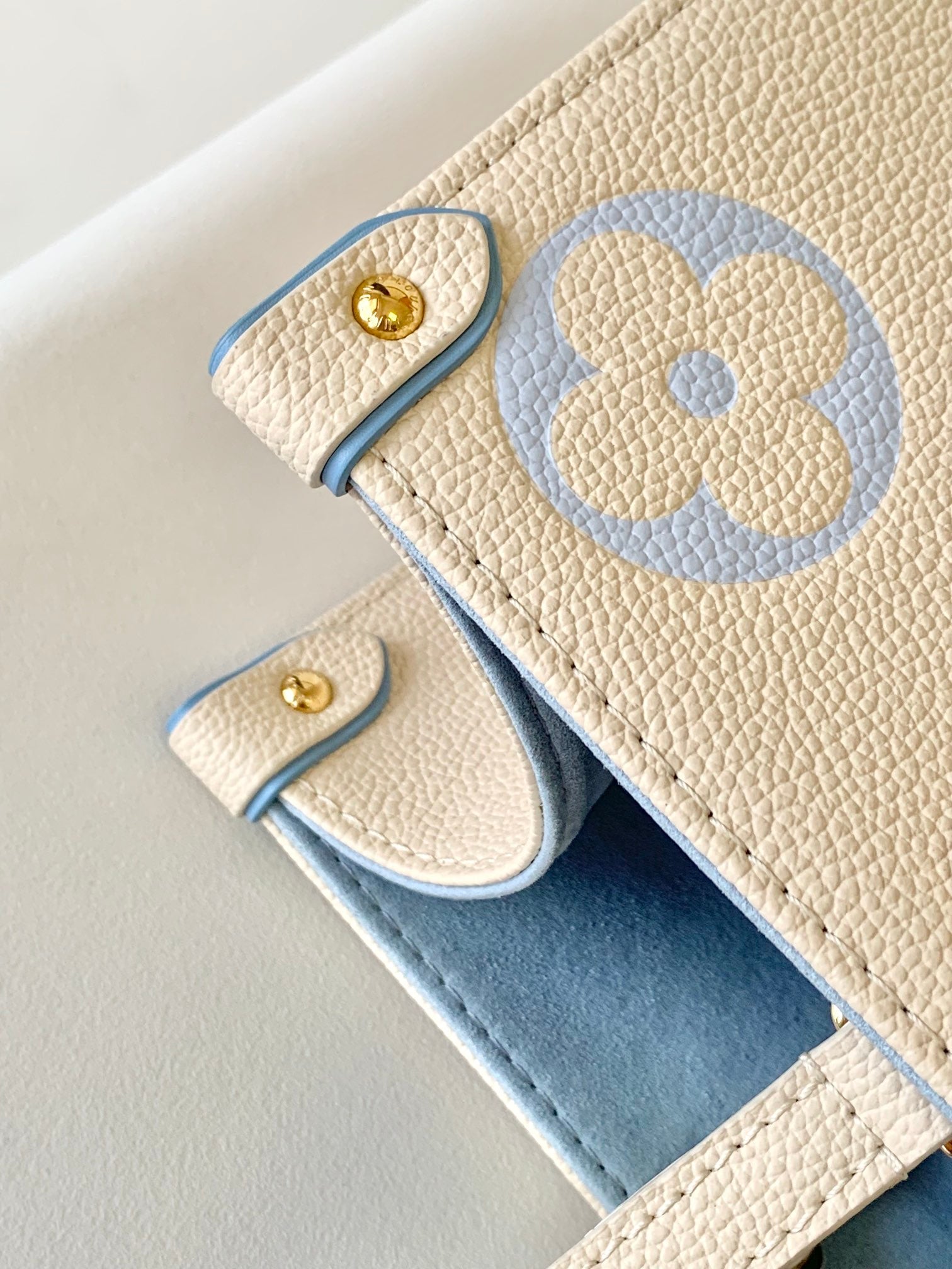 Louis Vuitton OnTheGo MM Monogram Empreinte Leather Tote Bag - Cream/Blue