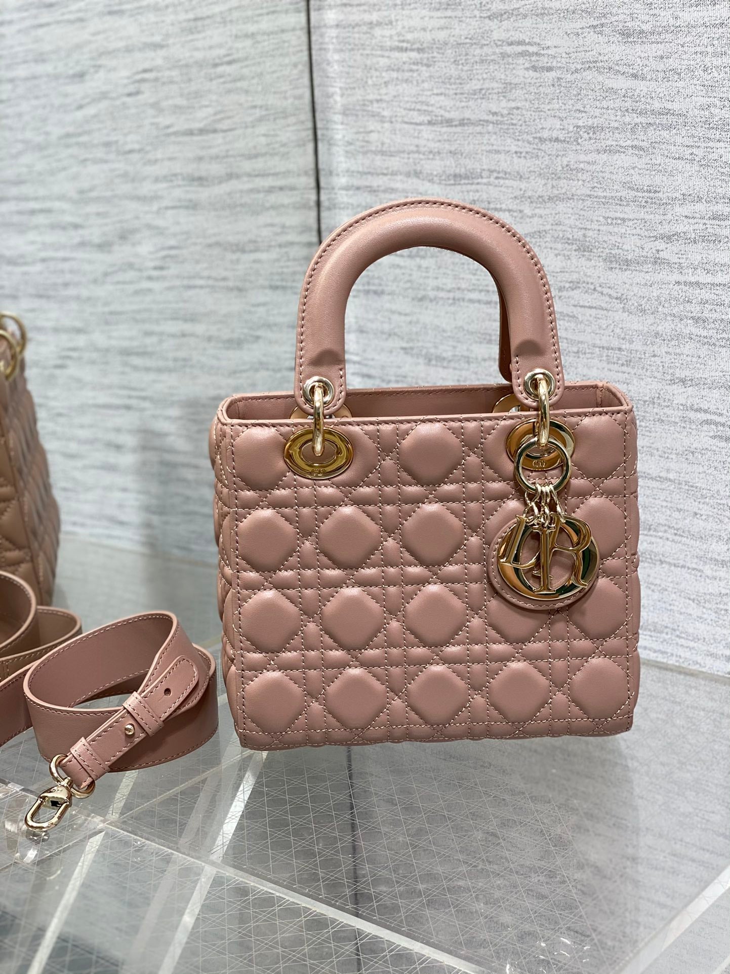 Dior Elegant Blush Pink Quilted Leather Handbag with Shoulder Strap