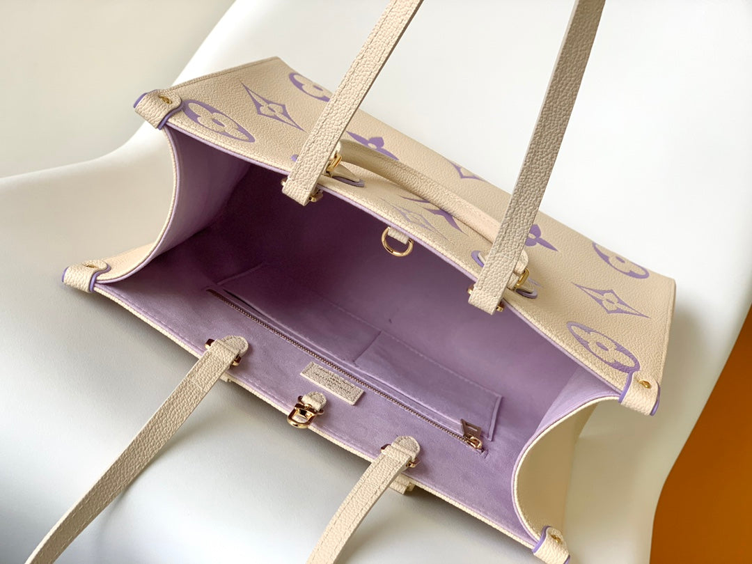 Louis Vuitton OnTheGo MM Monogram Empreinte Giant Tote Bag - Cream/Purple