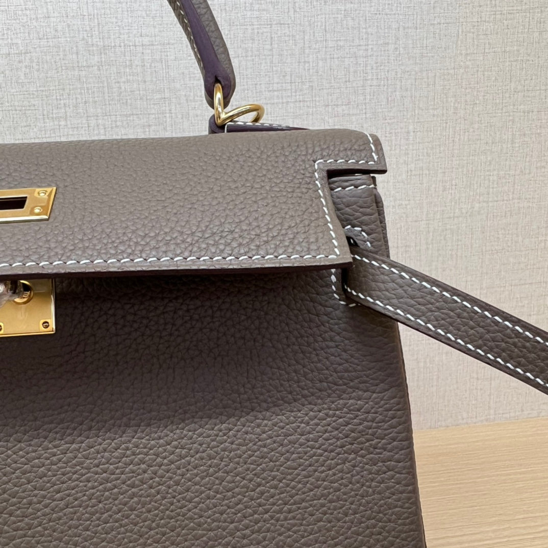 Luxury Two-Tone Leather Top-Handle Handbag - Elegant Brown and Grey Satchel