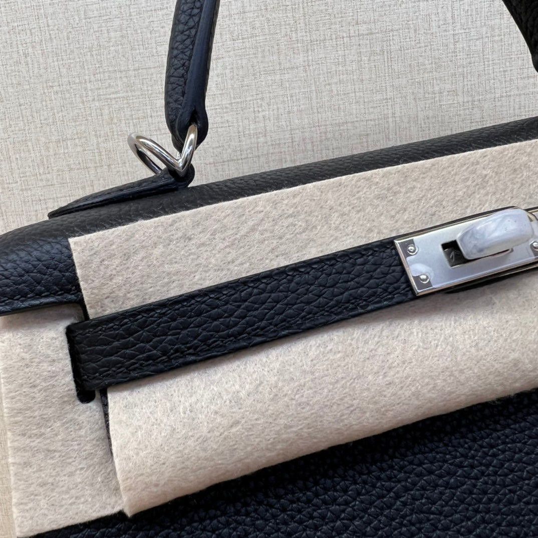 Luxury Black and Beige Top Handle Leather Handbag - Elegant Designer Style
