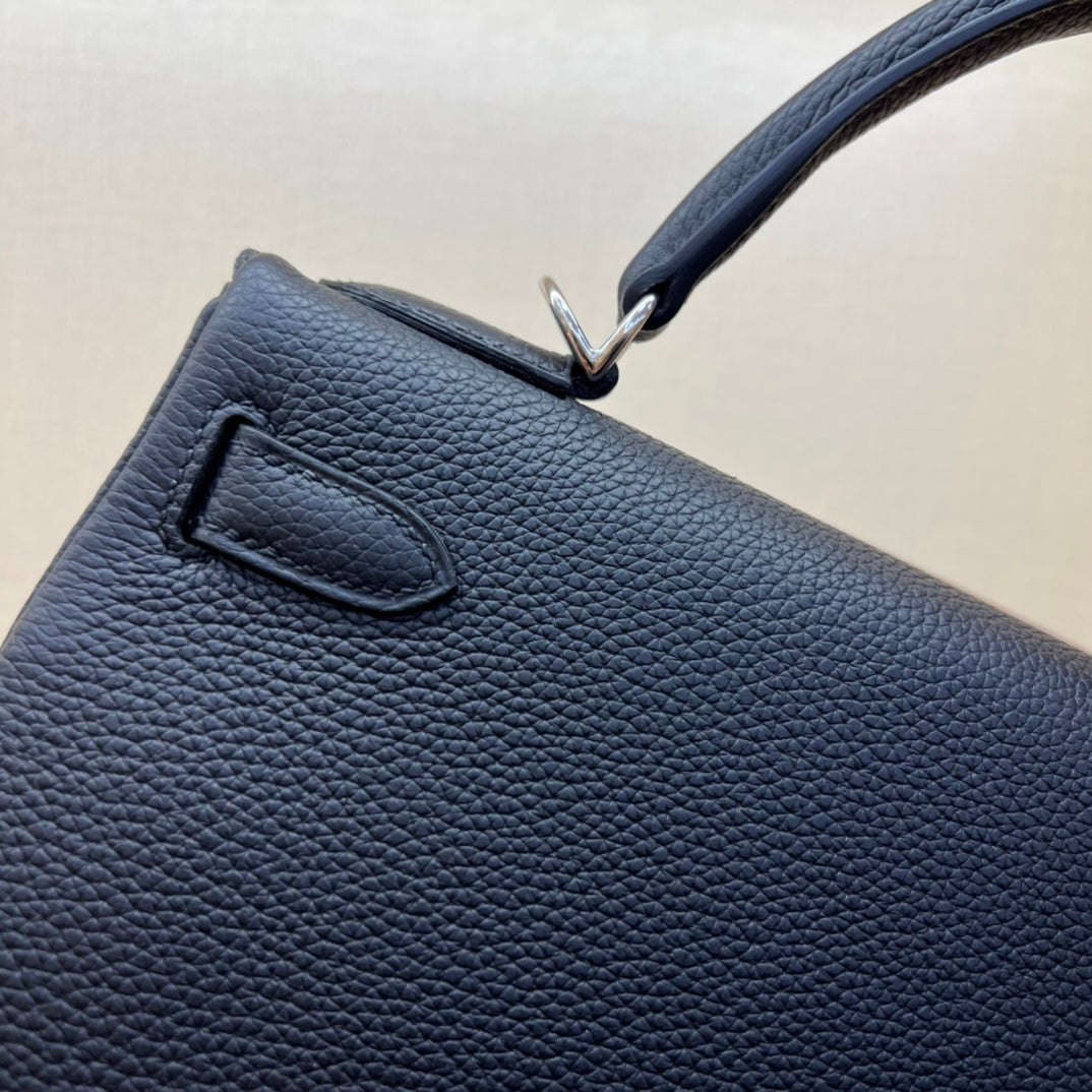 Elegant Black Leather Top-Handle Handbag with Silver-Tone Hardware