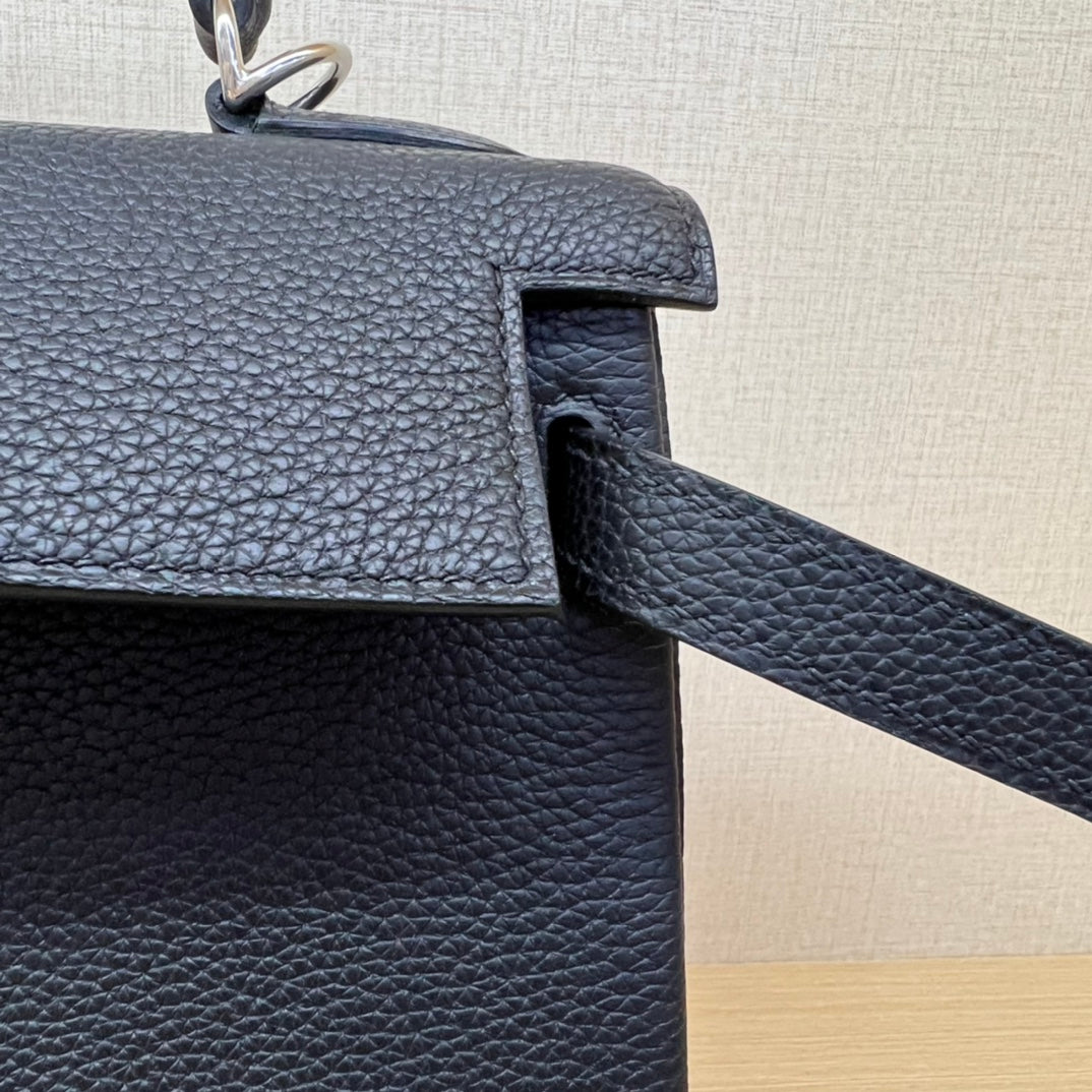 Elegant Black Leather Top-Handle Handbag with Silver-Tone Hardware