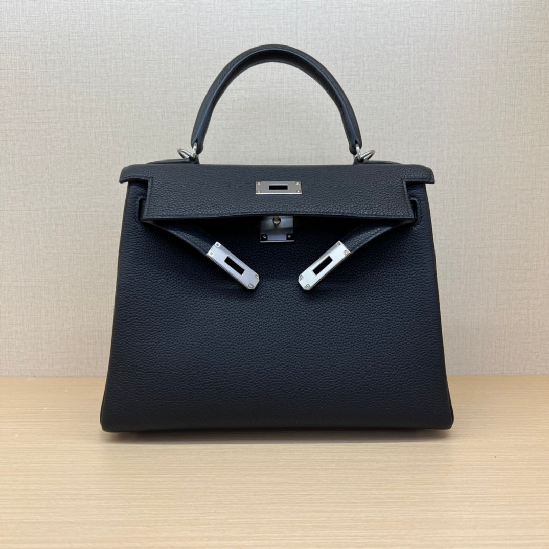 Elegant Black Leather Top-Handle Handbag with Silver-Tone Hardware