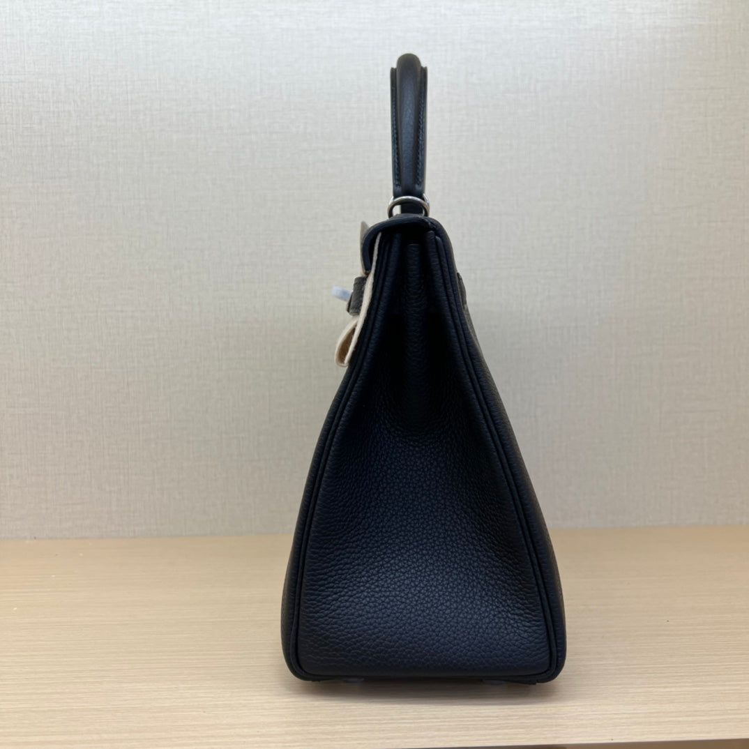 Elegant Black Leather Top-Handle Handbag with Silver-Tone Hardware