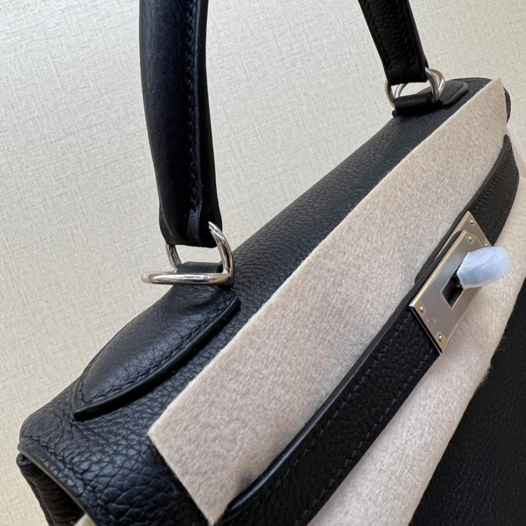 Elegant Black Leather Top-Handle Handbag with Silver-Tone Hardware