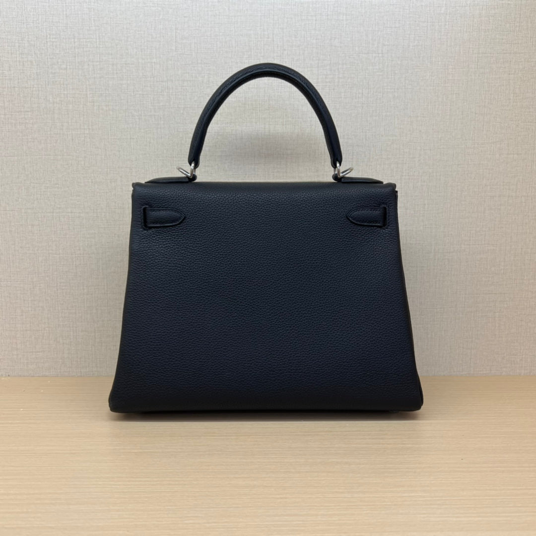 Elegant Black Leather Top-Handle Handbag with Silver-Tone Hardware