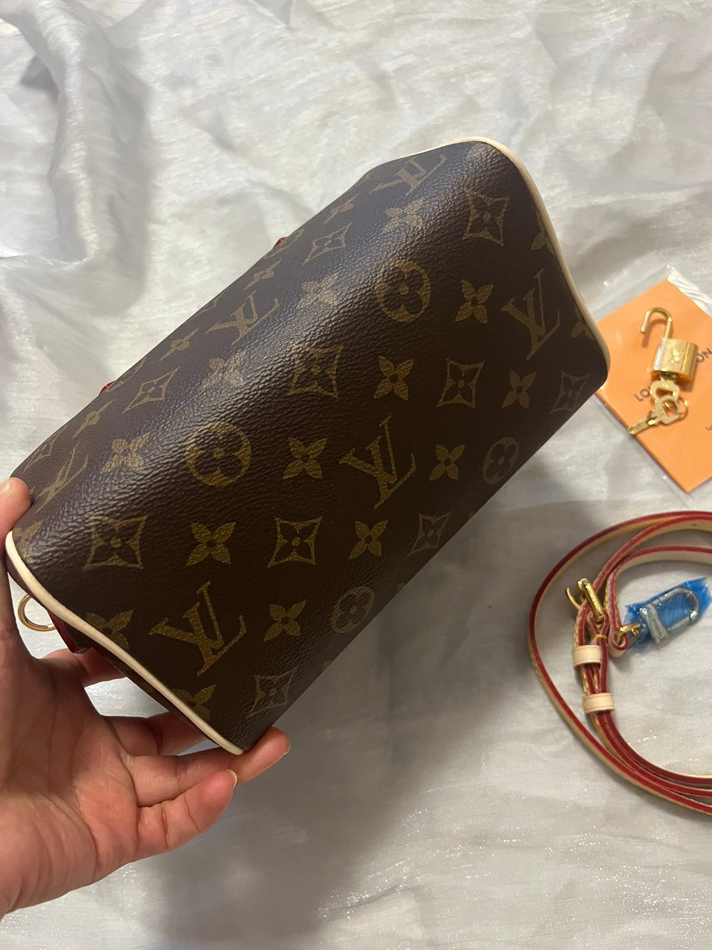 Louis Vuitton Nano Speedy Monogram Canvas Handbag with Adjustable Strap