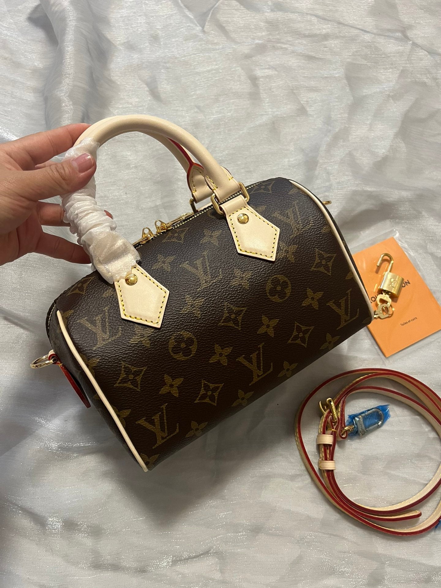 Louis Vuitton Nano Speedy Monogram Canvas Handbag with Adjustable Strap