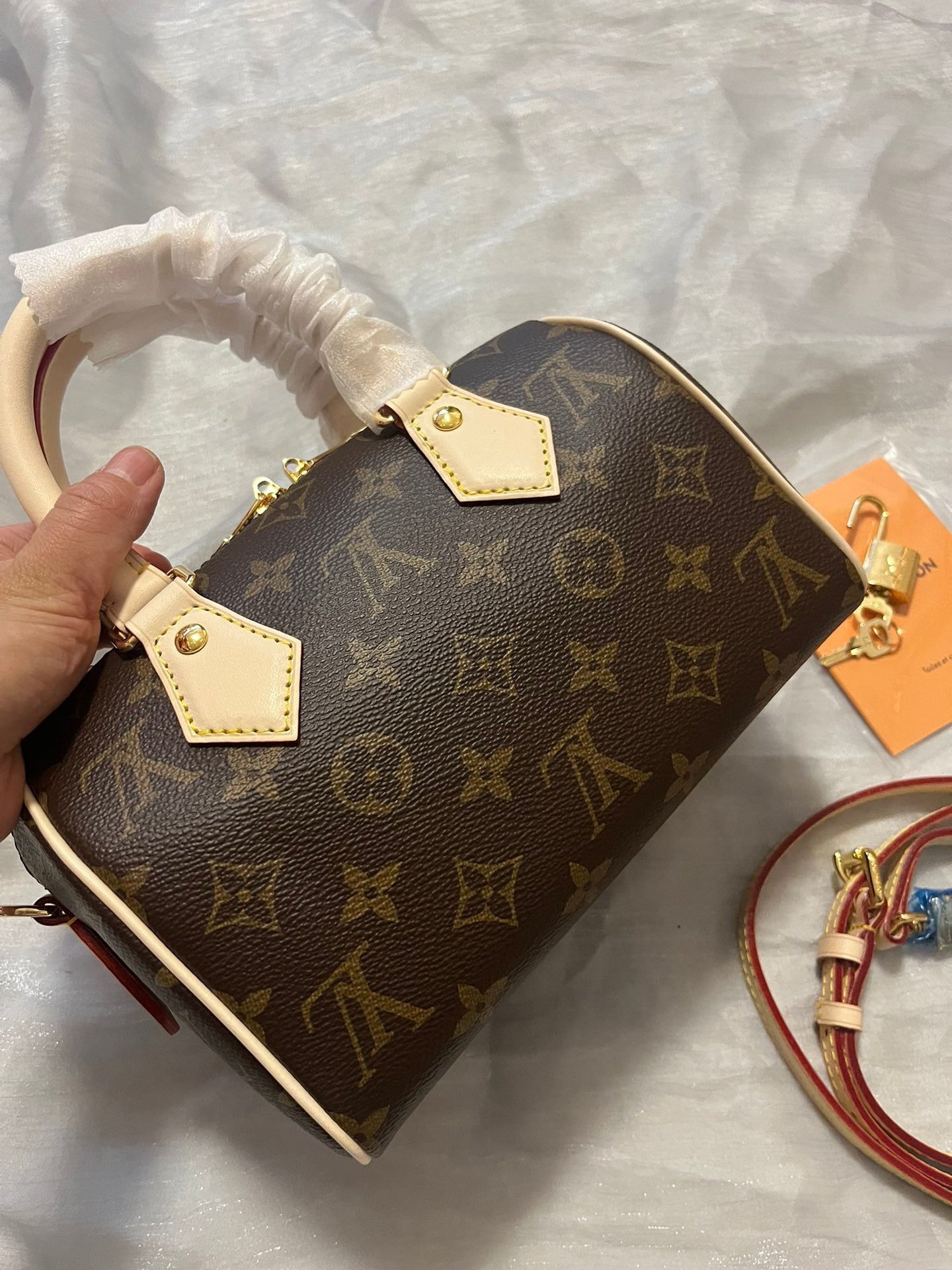 Louis Vuitton Nano Speedy Monogram Canvas Handbag with Adjustable Strap