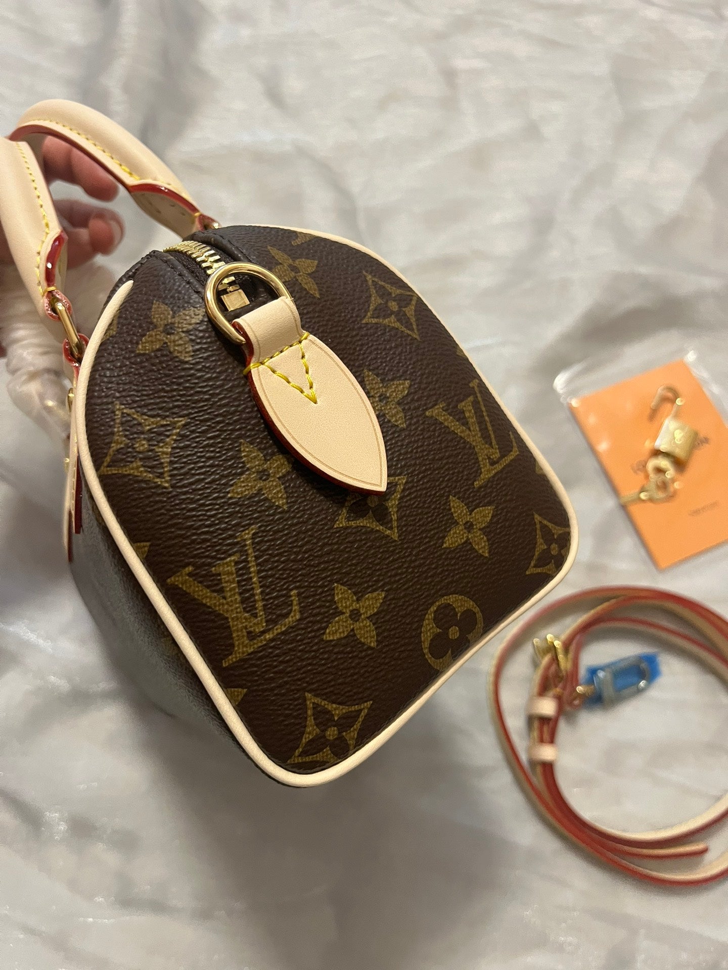 Louis Vuitton Nano Speedy Monogram Canvas Handbag with Adjustable Strap