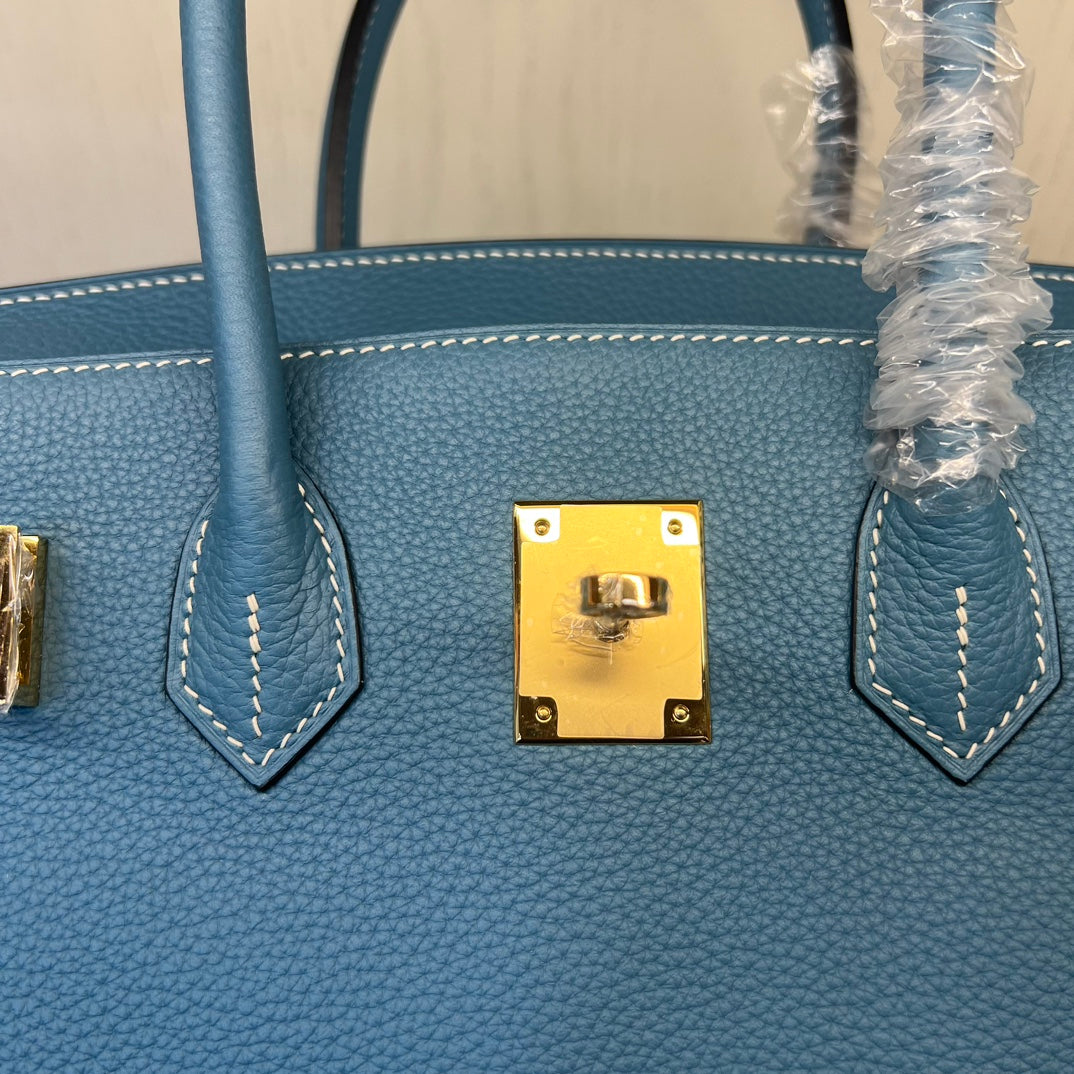 Luxury Blue Leather Handbag - Classic Top Handle Tote with Gold-Tone Hardware