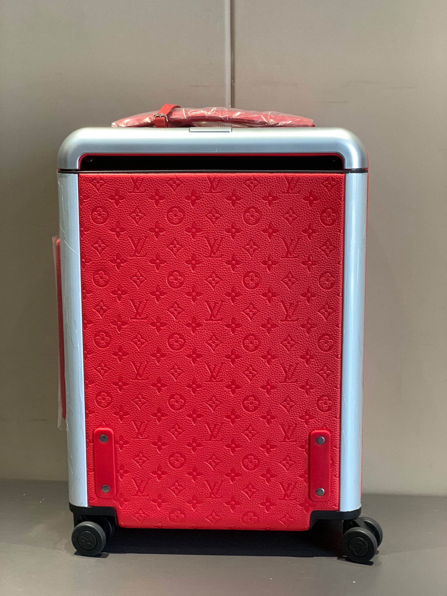 Red Monogram Embossed Hardshell Rolling Suitcase Travel Luggage