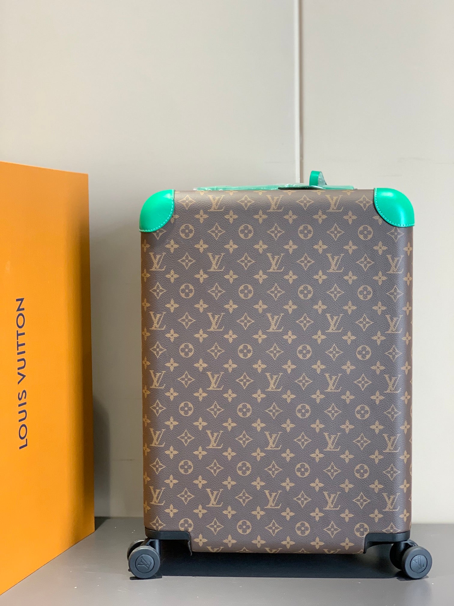 Brown Monogram Rolling Suitcase with Green Handle and Spinner Wheels