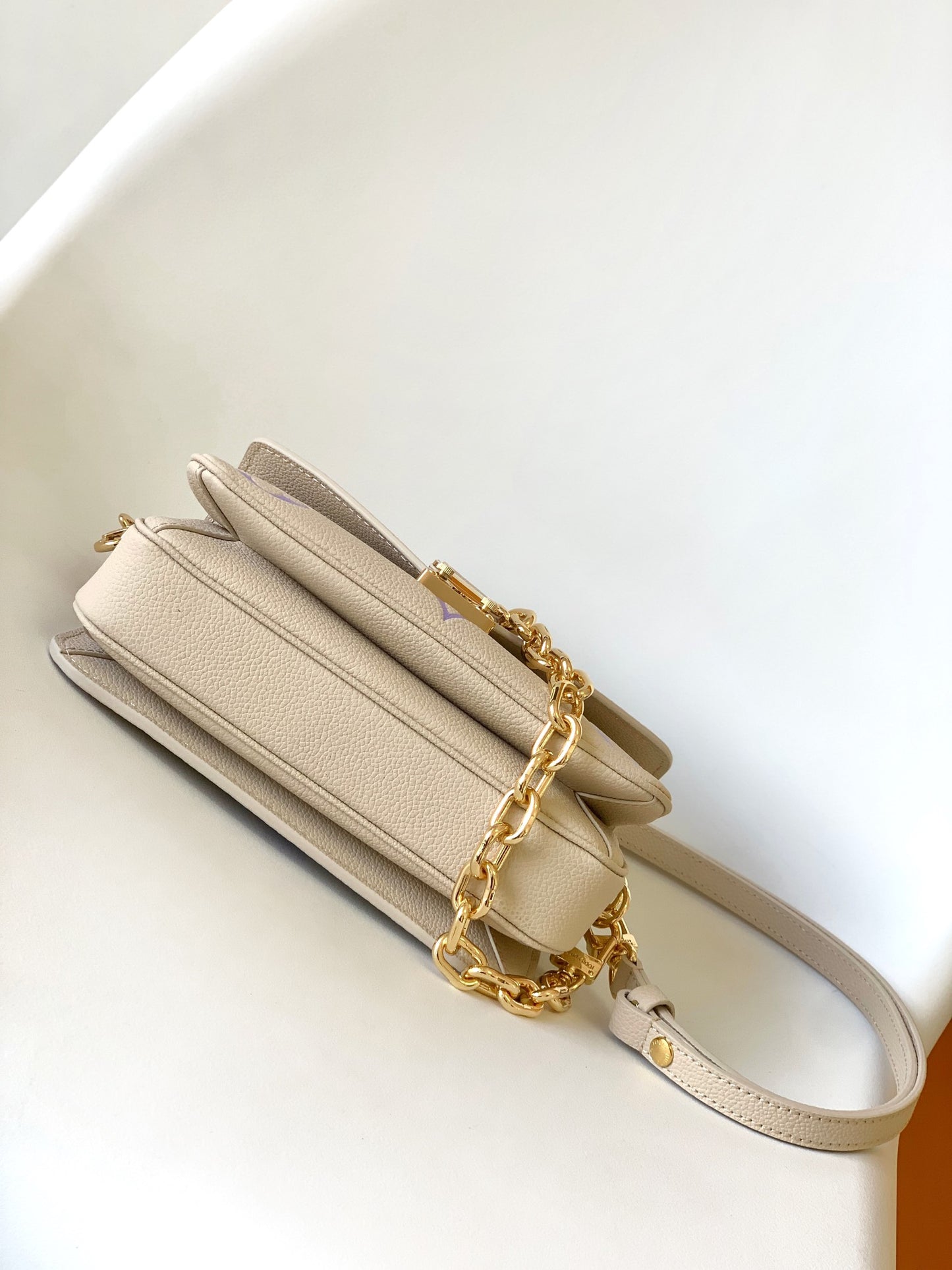 Louis Vuitton Pochette Métis East West Monogram Empreinte Leather Handbag - Beige/Purple