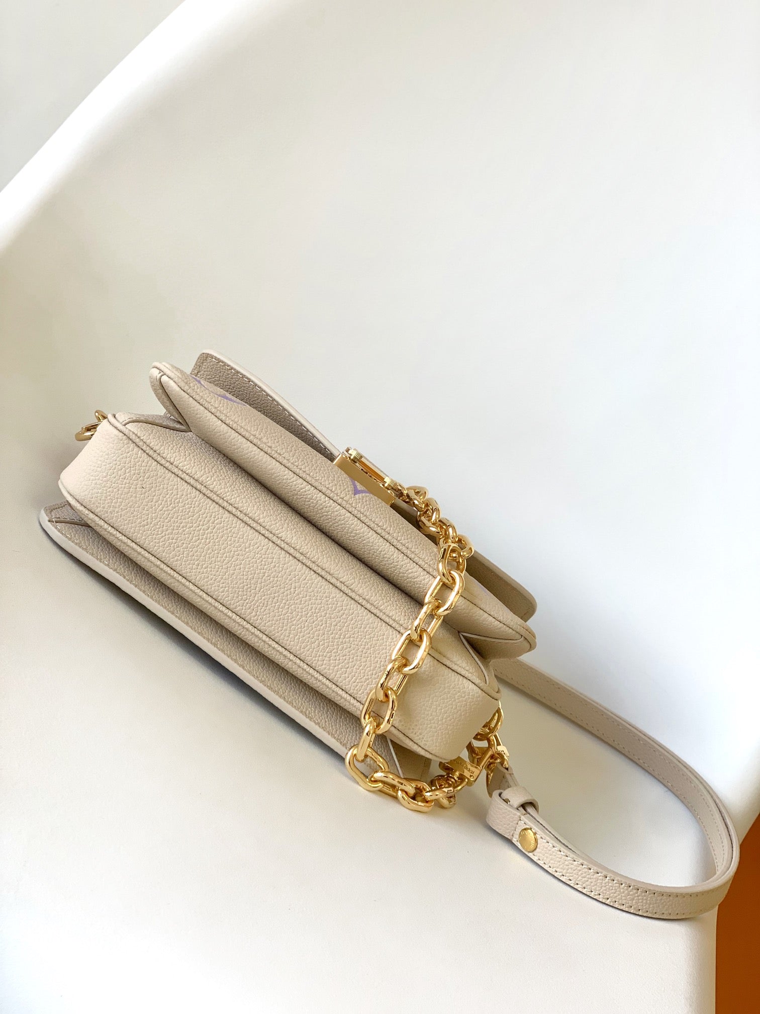 Louis Vuitton Pochette Métis East West Monogram Empreinte Leather Handbag - Beige/Purple