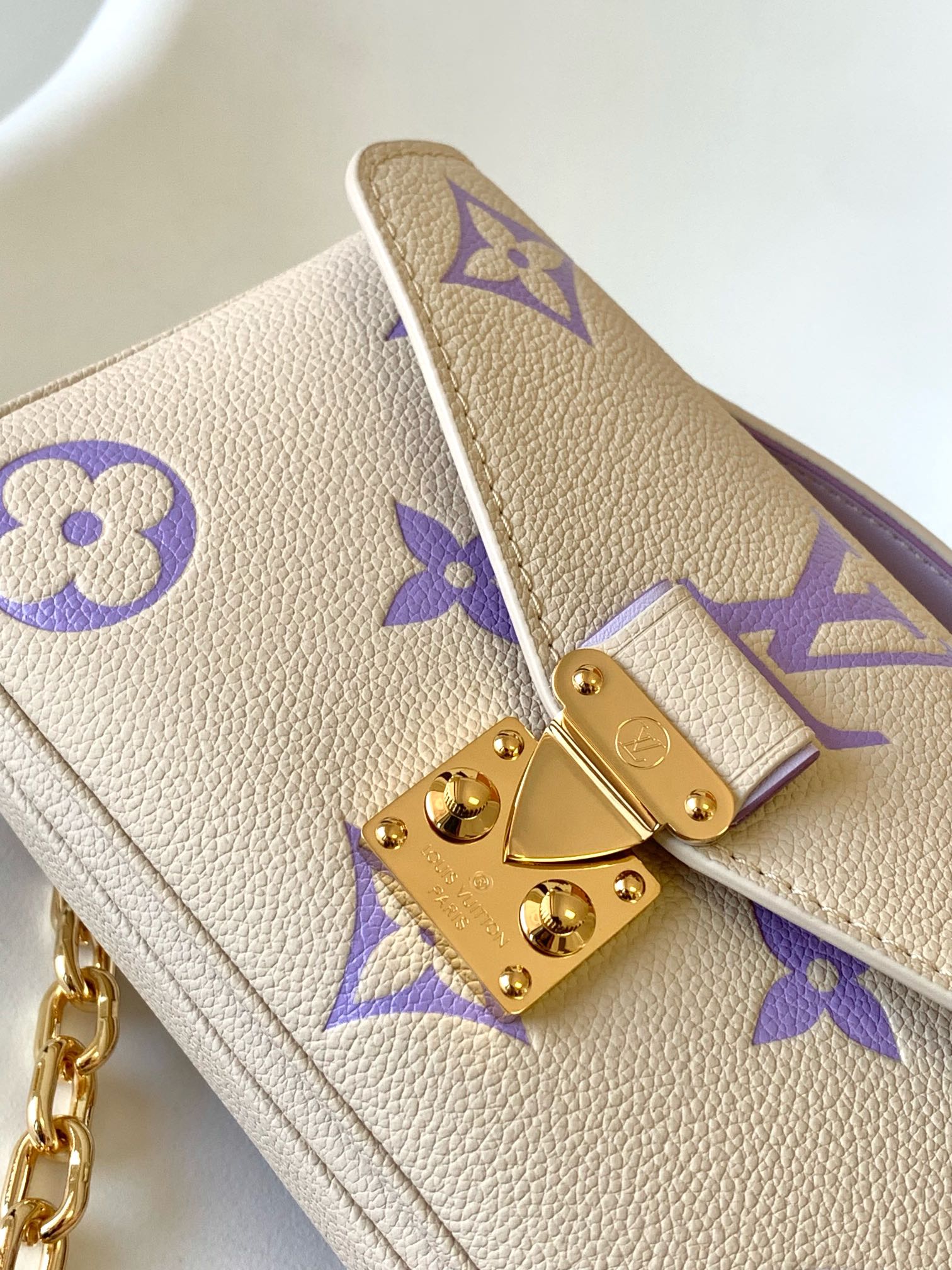 Louis Vuitton Pochette Métis East West Monogram Empreinte Leather Handbag - Beige/Purple