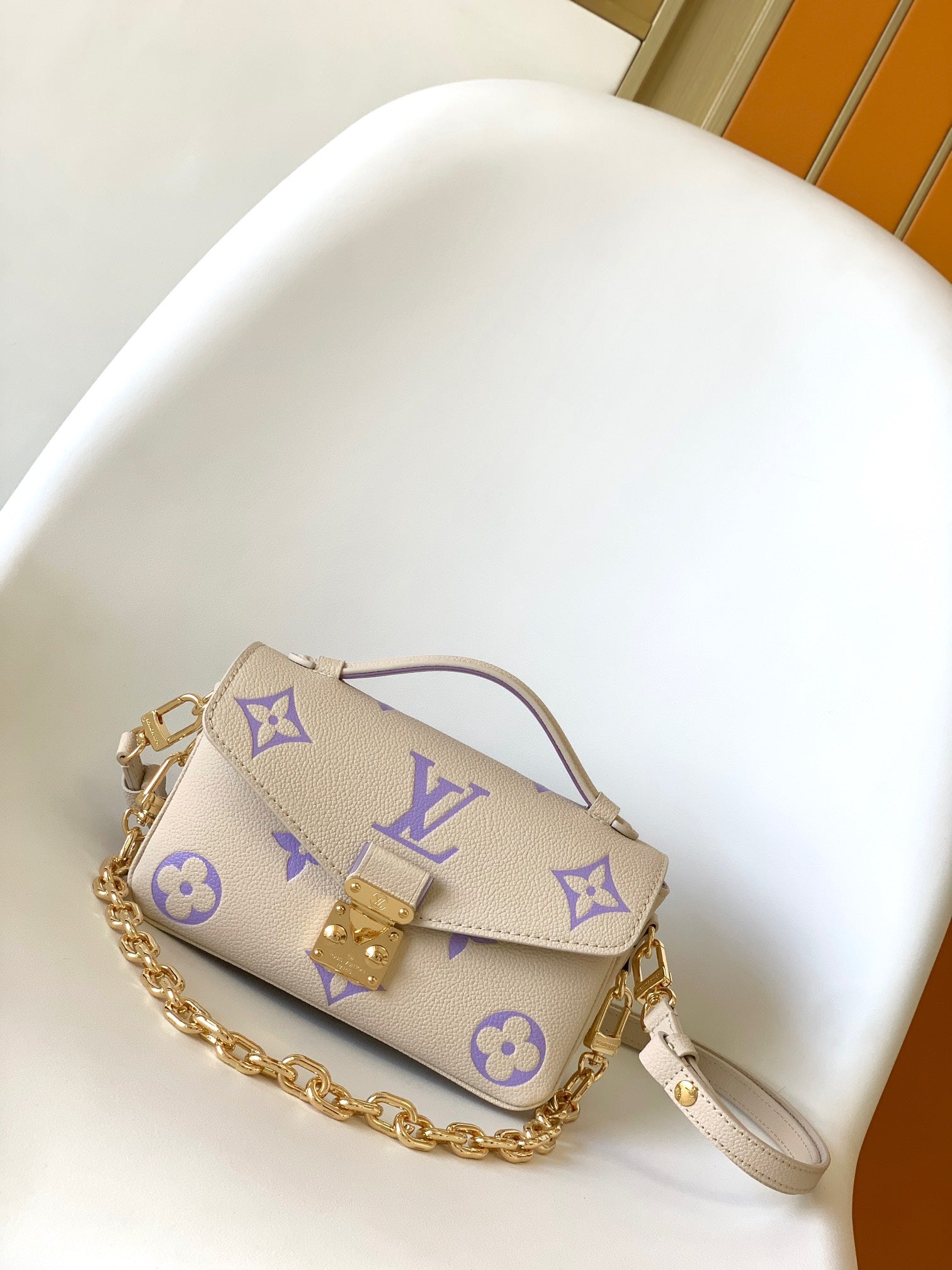 Louis Vuitton Pochette Métis East West Monogram Empreinte Leather Handbag - Beige/Purple