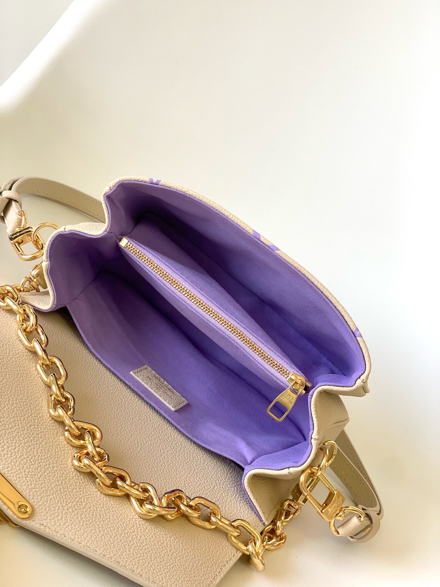 Louis Vuitton Pochette Métis East West Monogram Empreinte Leather Handbag - Beige/Purple