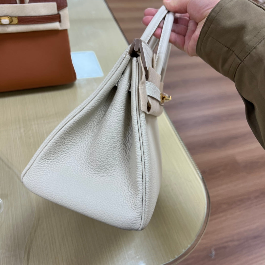 Luxury White Leather Top Handle Handbag with Gold Clasp Detail