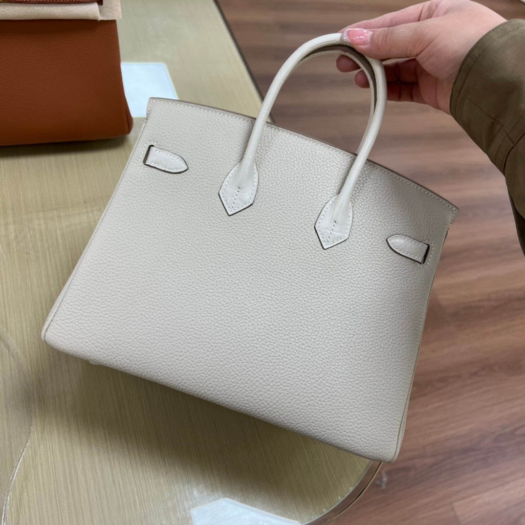 Luxury White Leather Top Handle Handbag with Gold Clasp Detail