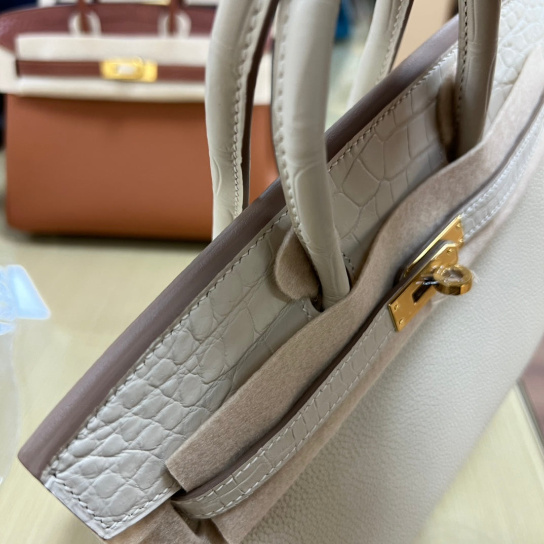 Luxury White Leather Top Handle Handbag with Gold Clasp Detail