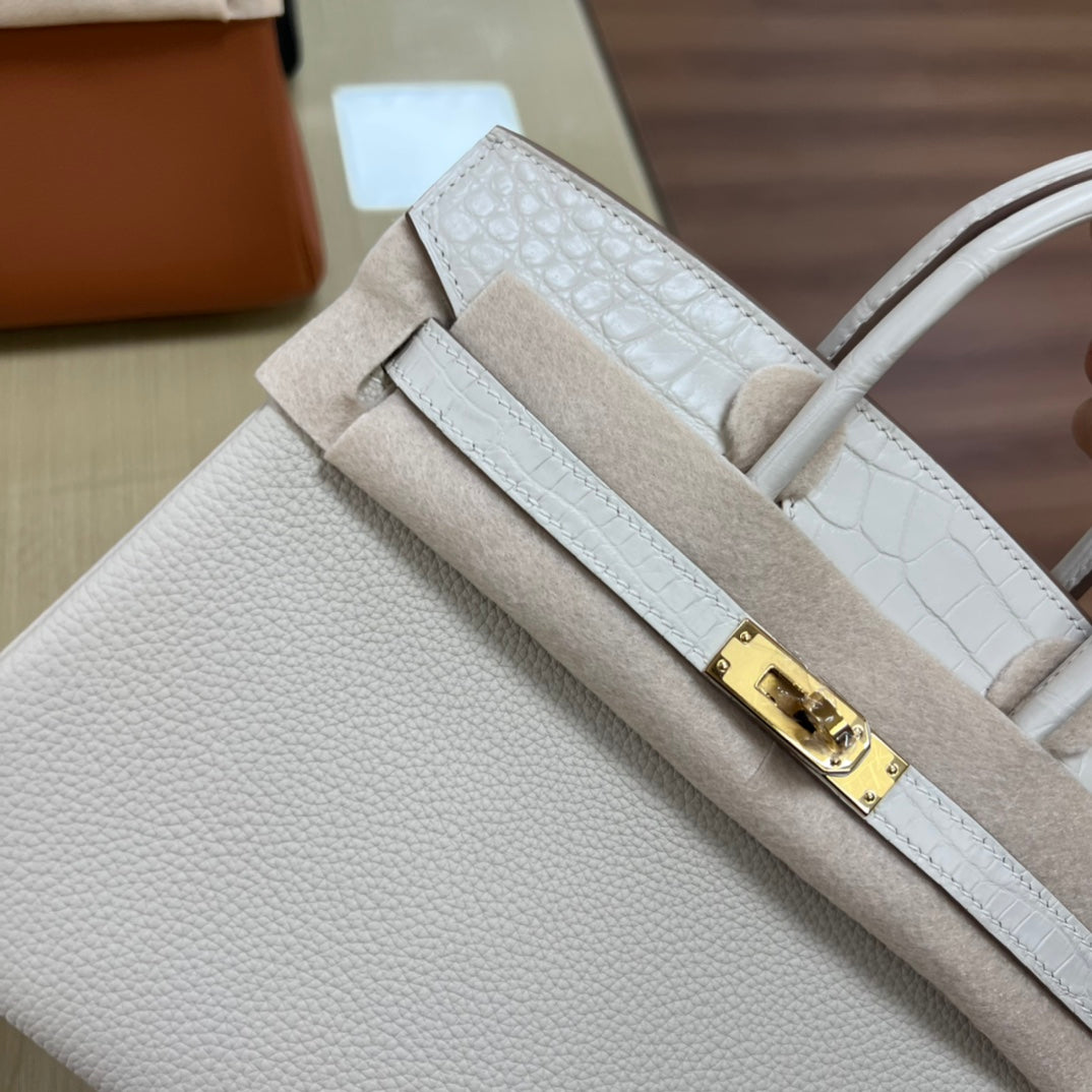 Luxury White Leather Top Handle Handbag with Gold Clasp Detail