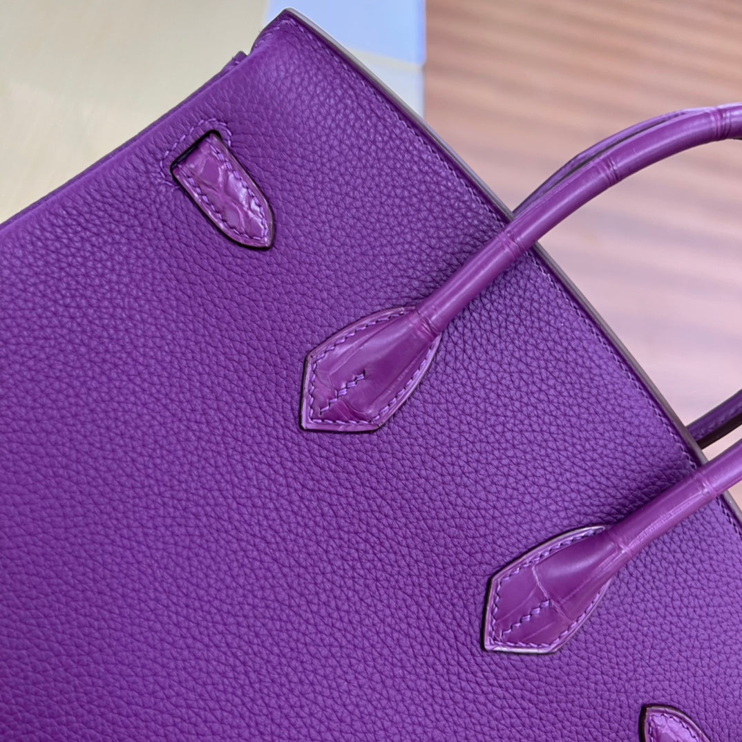 Elegant Purple Leather Top Handle Handbag with Silver Hardware