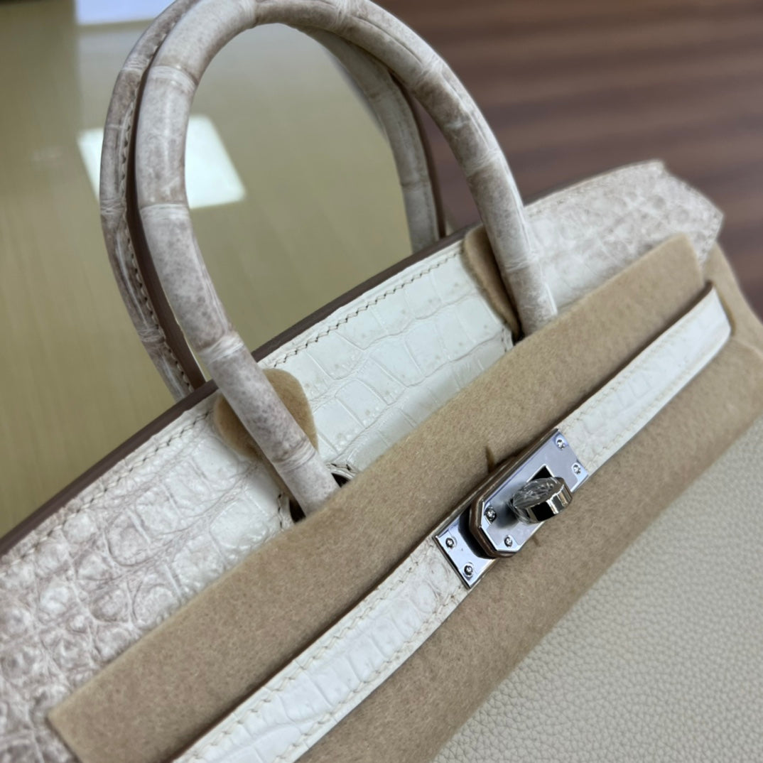 Elegant Cream Leather Top Handle Handbag with Textured Accents