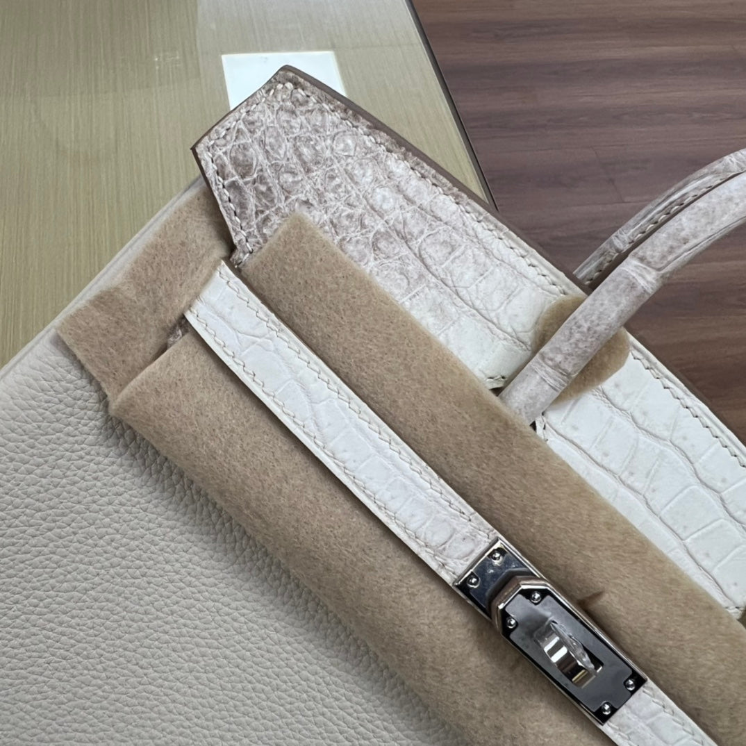 Elegant Cream Leather Top Handle Handbag with Textured Accents