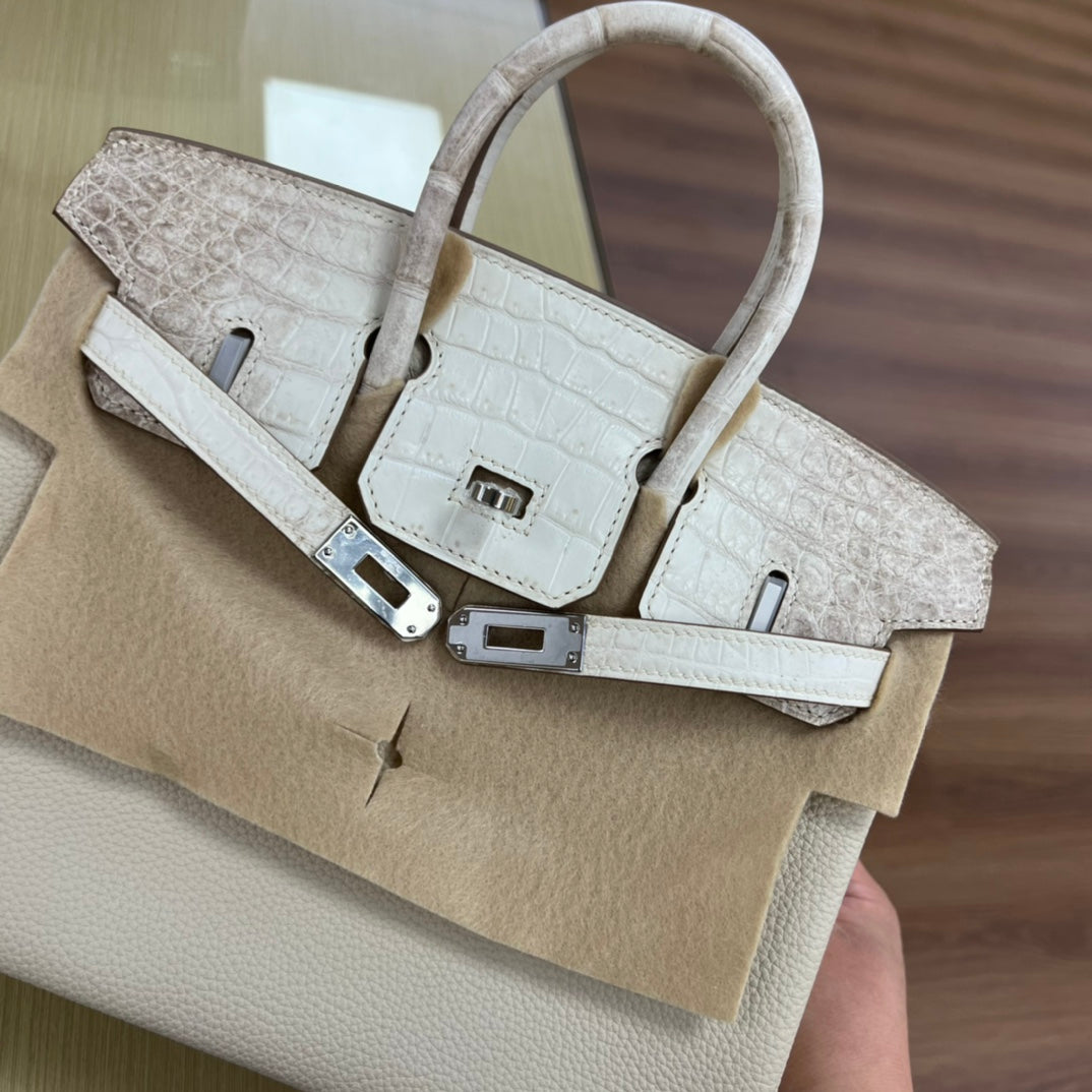 Elegant Cream Leather Top Handle Handbag with Textured Accents