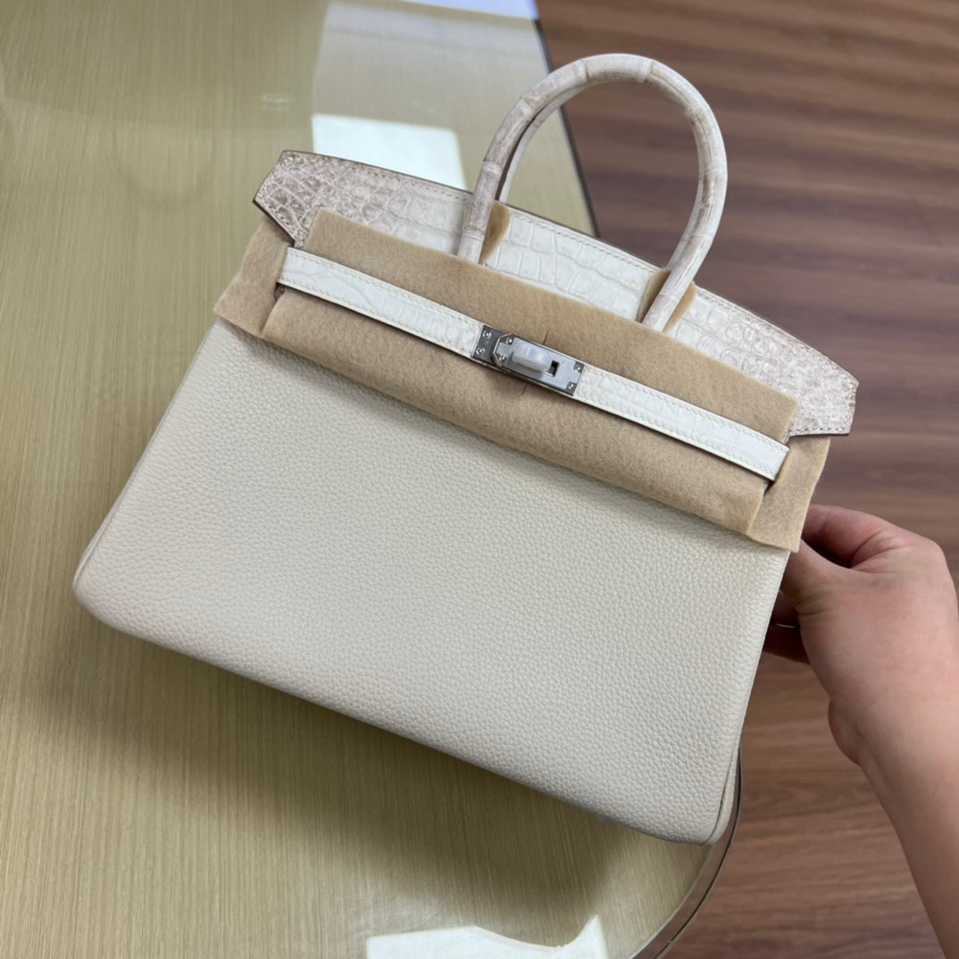 Elegant Cream Leather Top Handle Handbag with Textured Accents