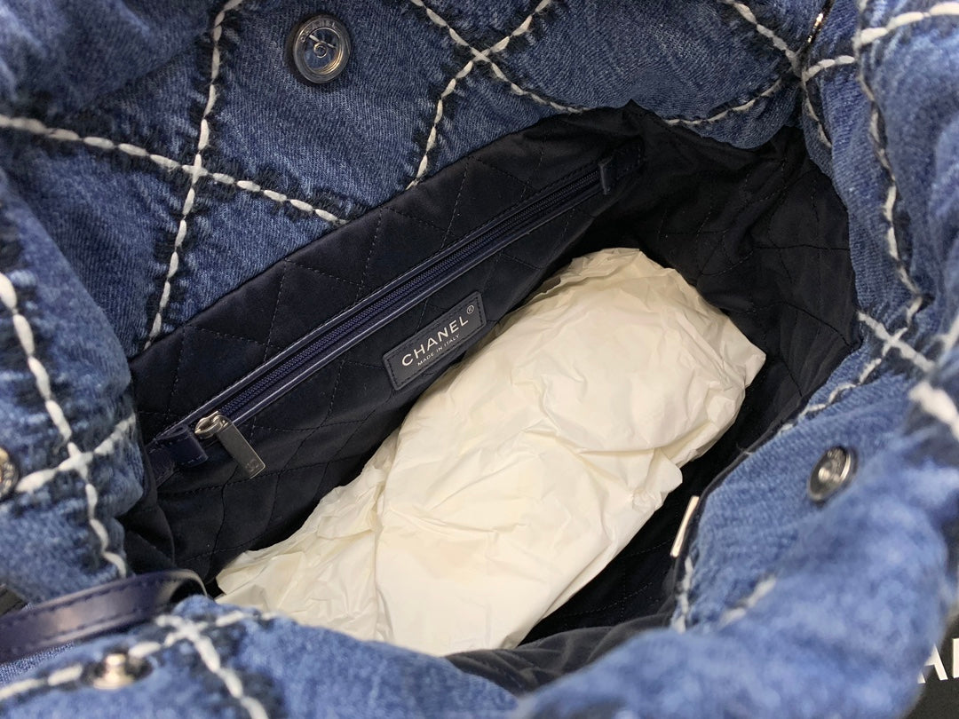 Chanel Quilted Denim Drawstring Bag with Silver-Tone Chain