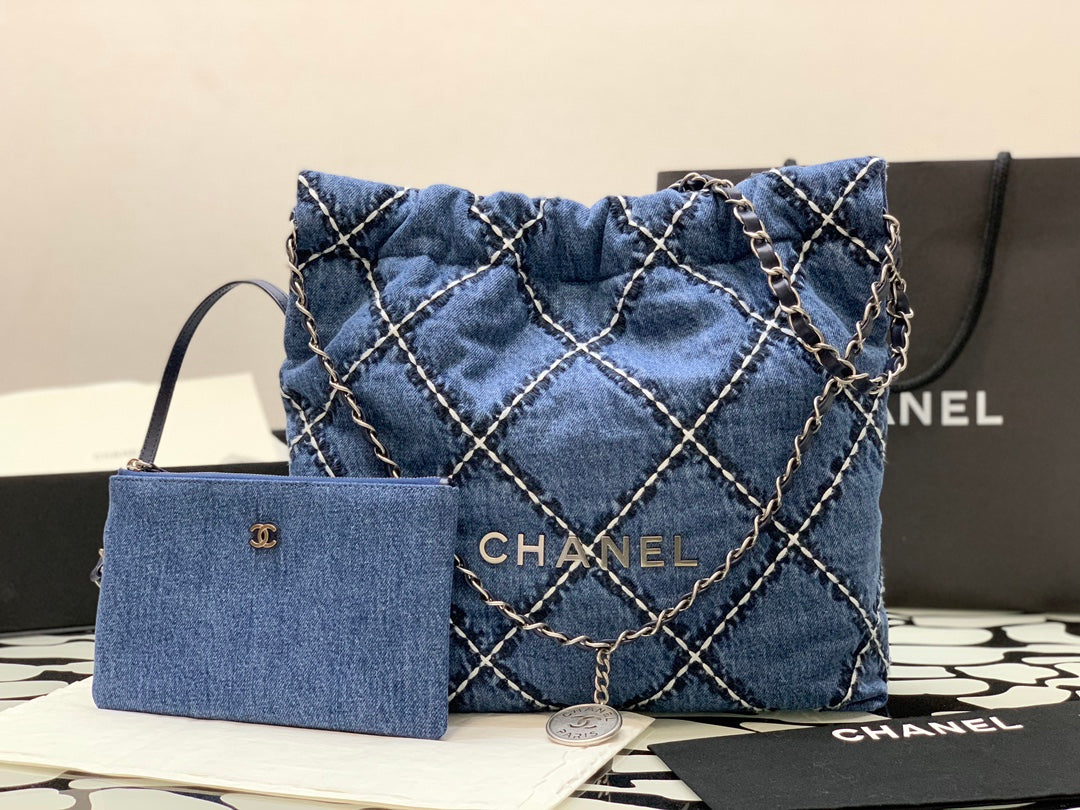 Chanel Quilted Denim Drawstring Bag with Silver-Tone Chain