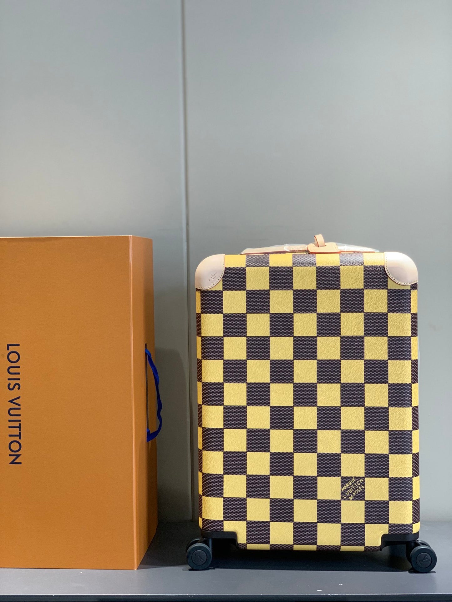 Checkerboard Pattern Rolling Suitcase with Leather Wrapped Handle